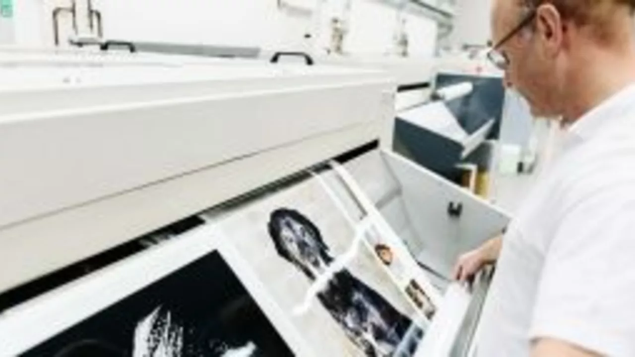 What is the best way to make copies of printed photos?